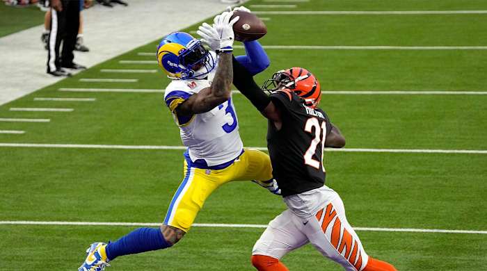 Los Angeles Rams wide receiver Odell Beckham Jr. (3) pulls in a touchdown pass as Cincinnati Bengals cornerback Mike Hilton (21) defends during the first half of the NFL Super Bowl 56 football game Sunday, Feb. 13, 2022, in Inglewood, Calif.